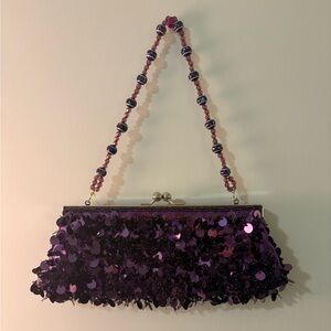Funky purple sequin clutch bag